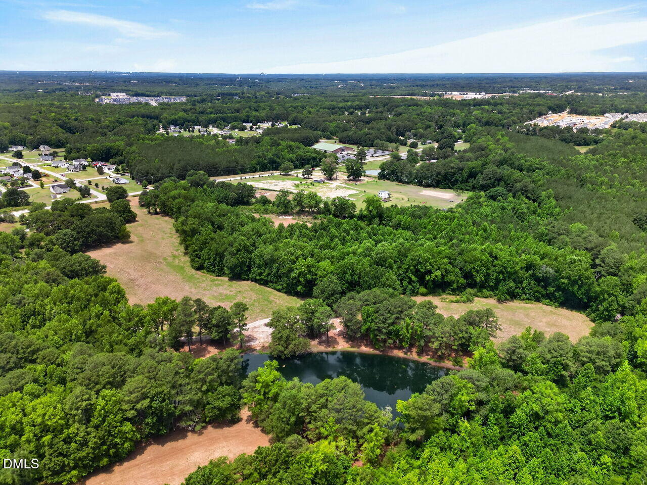 1217 Eagle Rock Road Wendell, NC 27591 - Photo 15 of 17 an aerial view of residential houses with outdoor space and trees