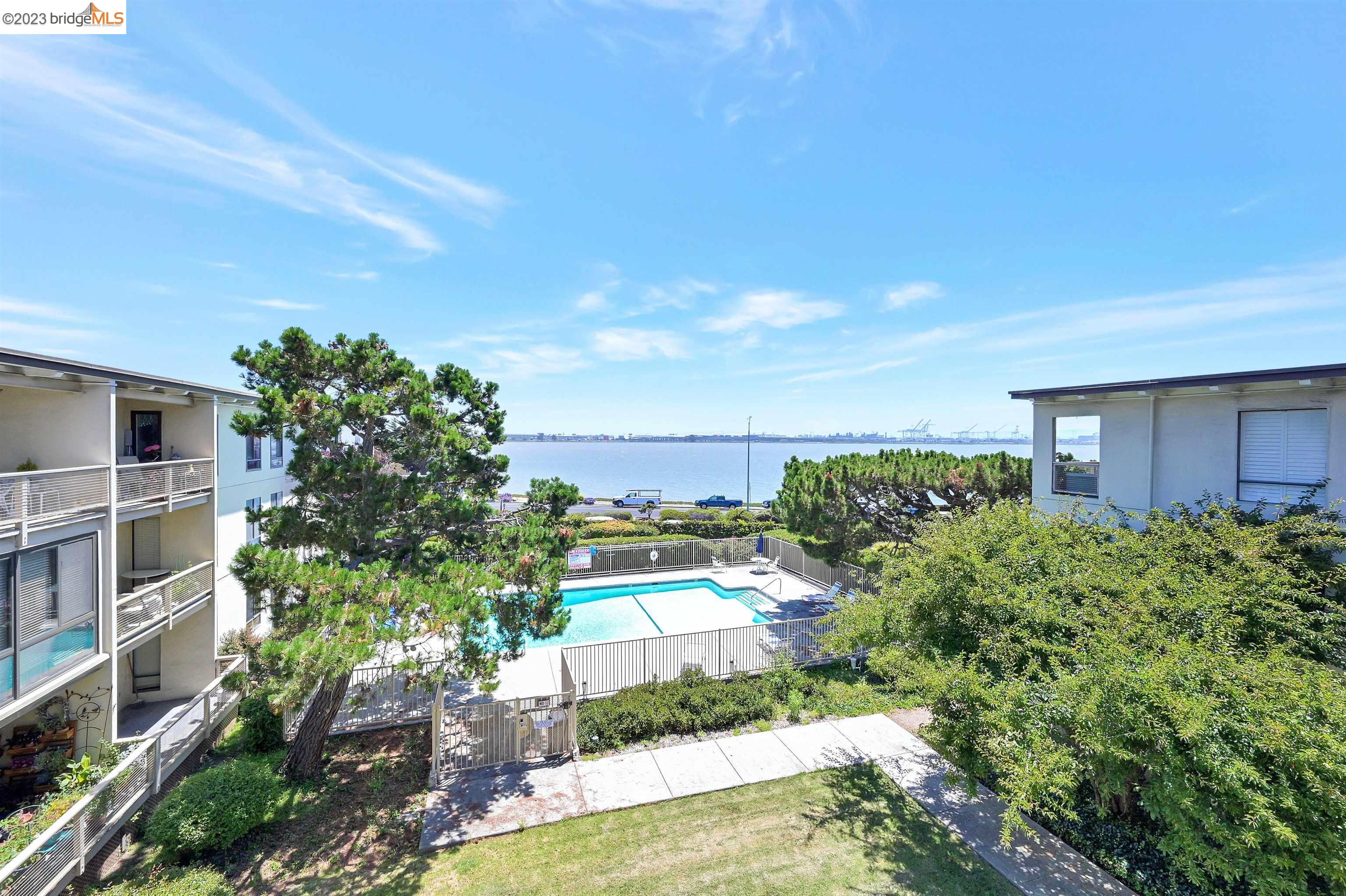 3 Commodore Drive, Unit B359 Emeryville, CA 94608 - Photo 1 of 1 a picture of a building with a garden