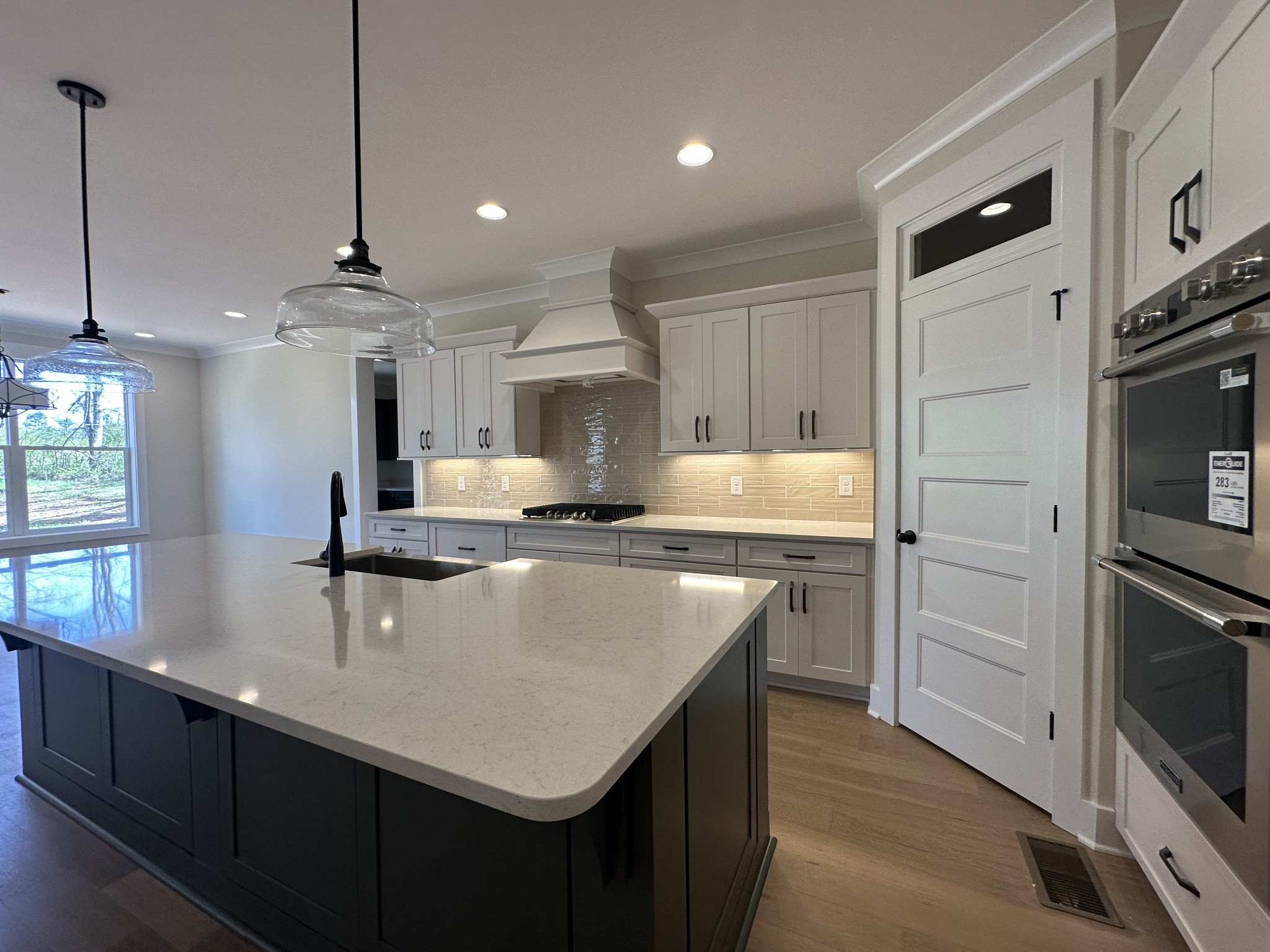 1576 Frye Road Columbia, TN 38401 - Photo 21 of 66 a kitchen with kitchen island a sink appliances and cabinets