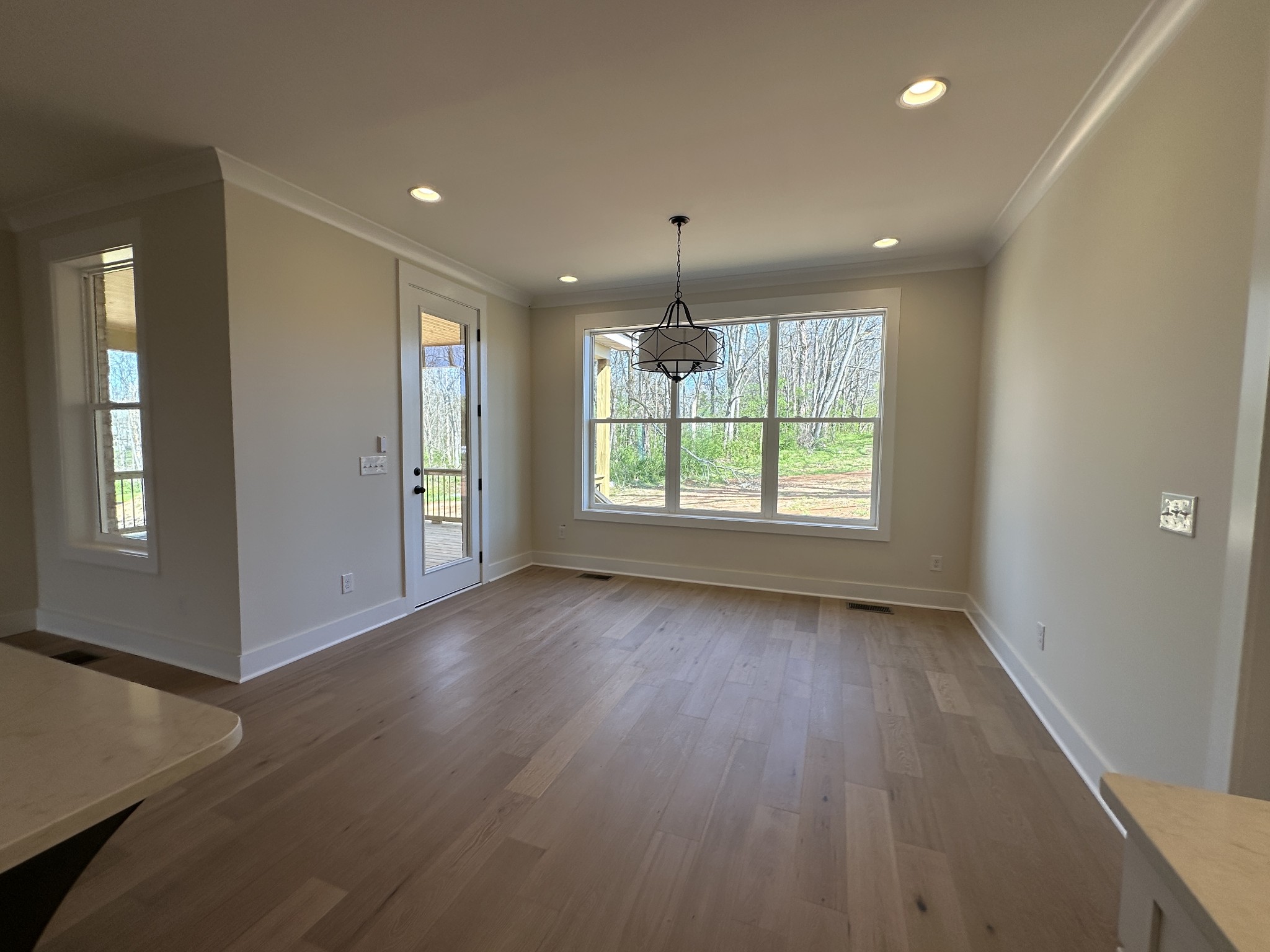 1576 Frye Road Columbia, TN 38401 - Photo 29 of 66 an empty room with wooden floor and windows