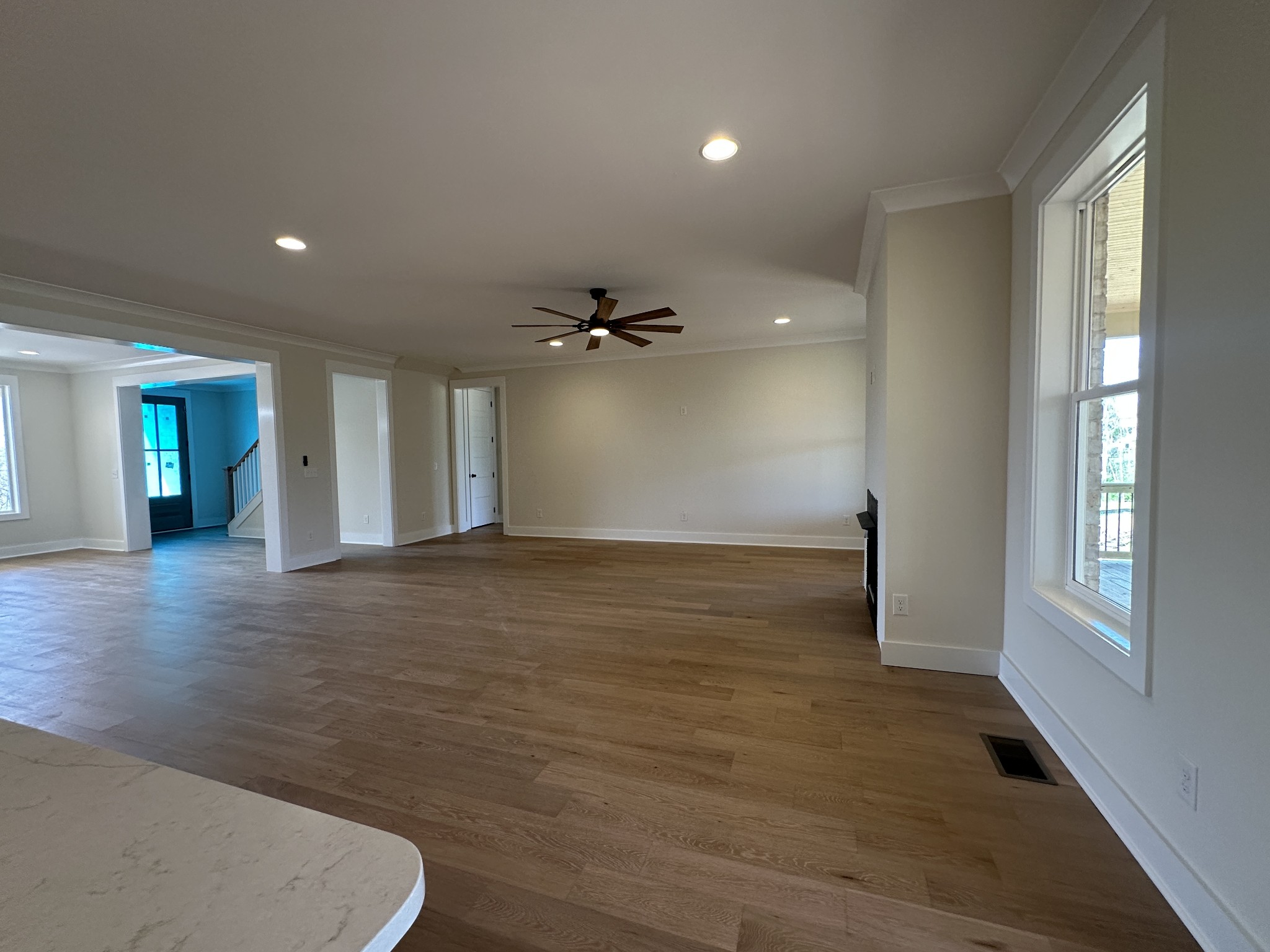 1576 Frye Road Columbia, TN 38401 - Photo 30 of 66 an empty room with wooden floor and windows