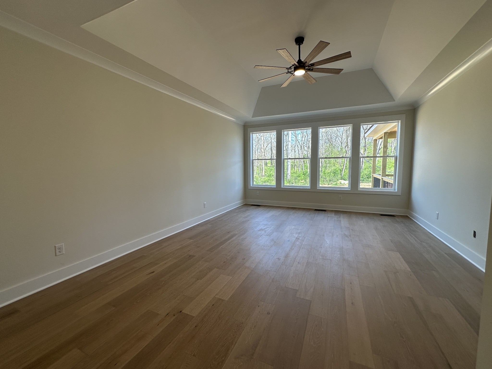 1576 Frye Road Columbia, TN 38401 - Photo 35 of 66 an empty room with wooden floor fan and windows