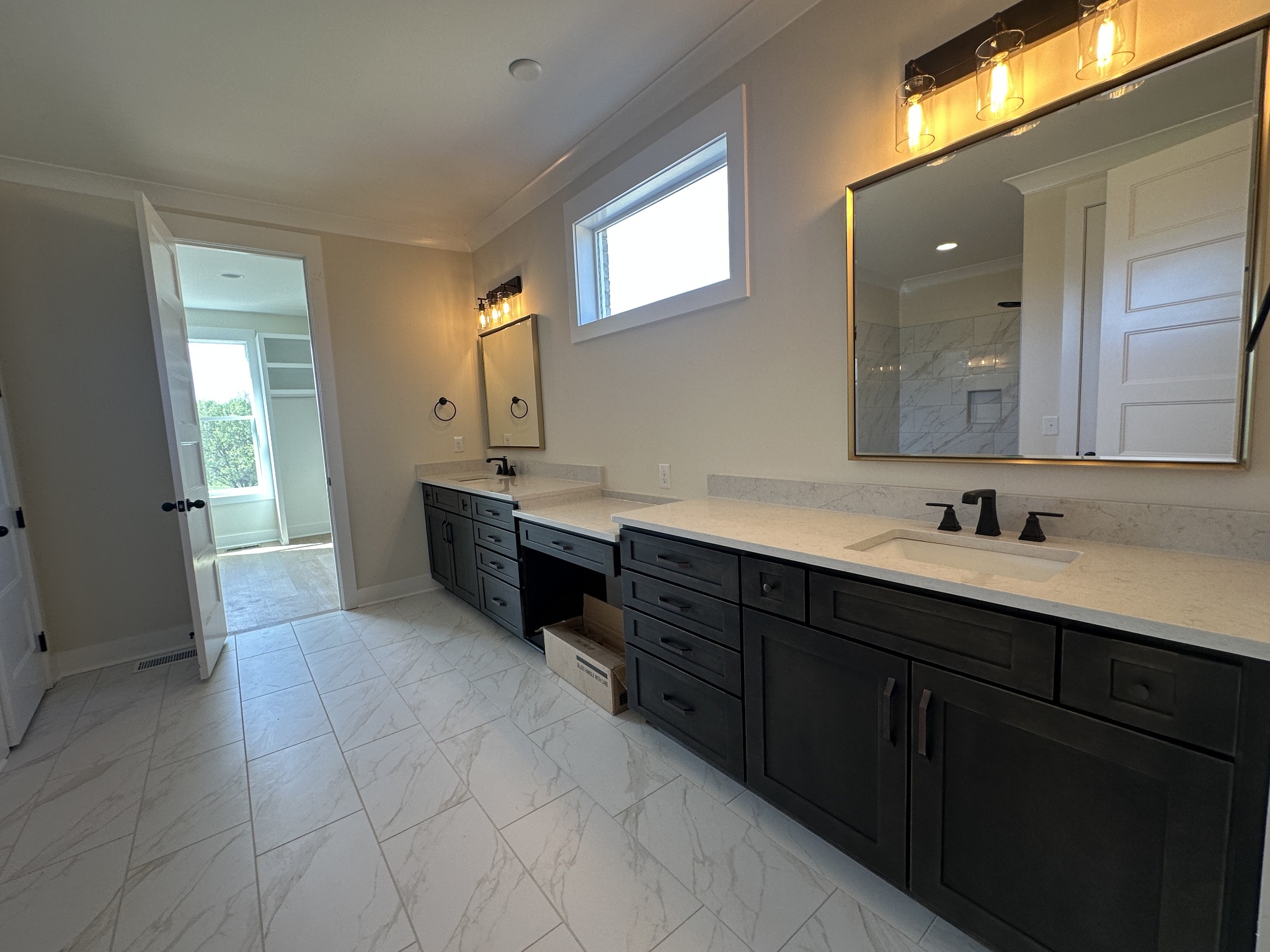 1576 Frye Road Columbia, TN 38401 - Photo 37 of 66 a spacious bathroom with a double vanity sink and a mirror