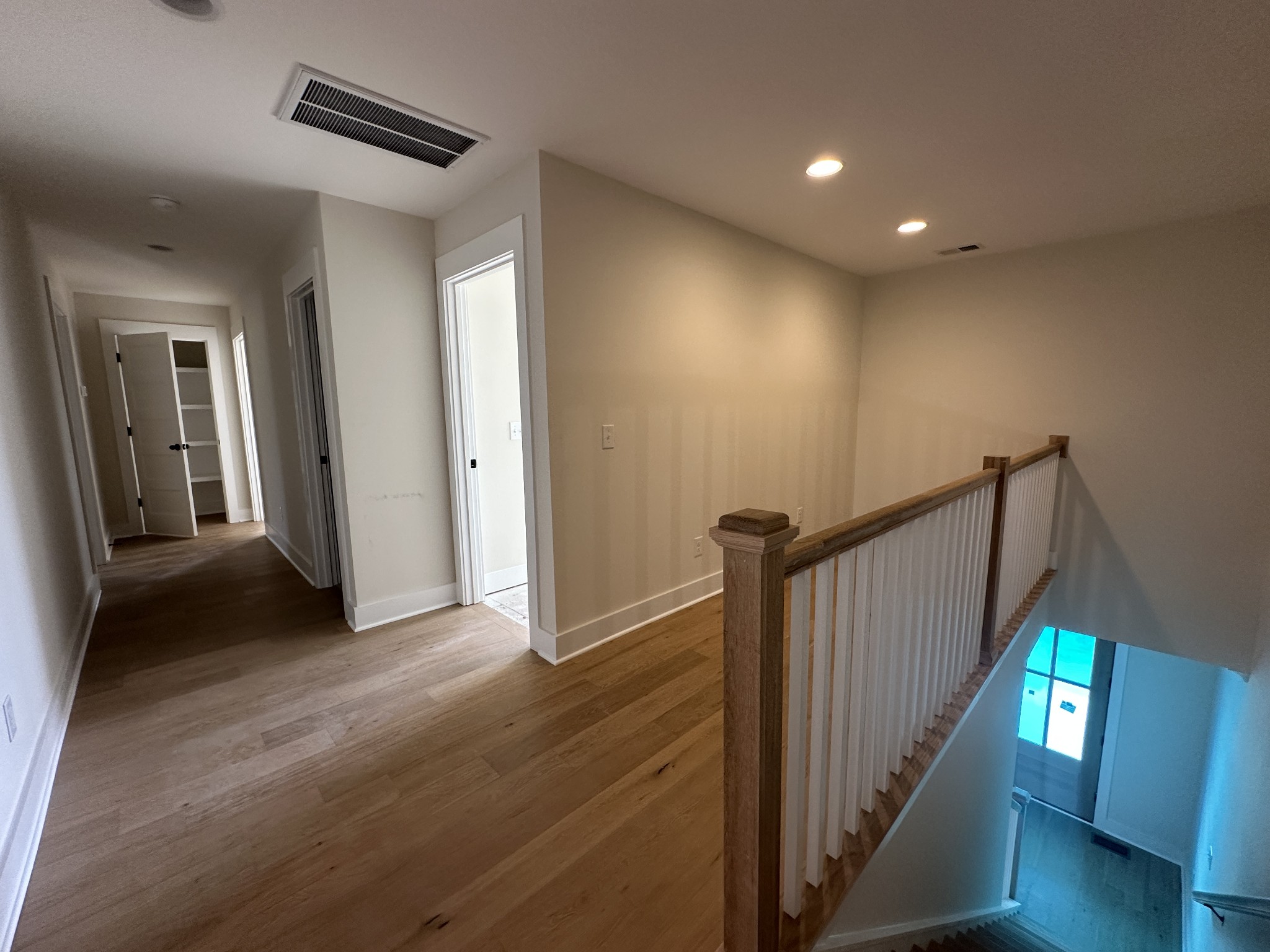 1576 Frye Road Columbia, TN 38401 - Photo 48 of 66 a view of a hallway with wooden floor and stairs