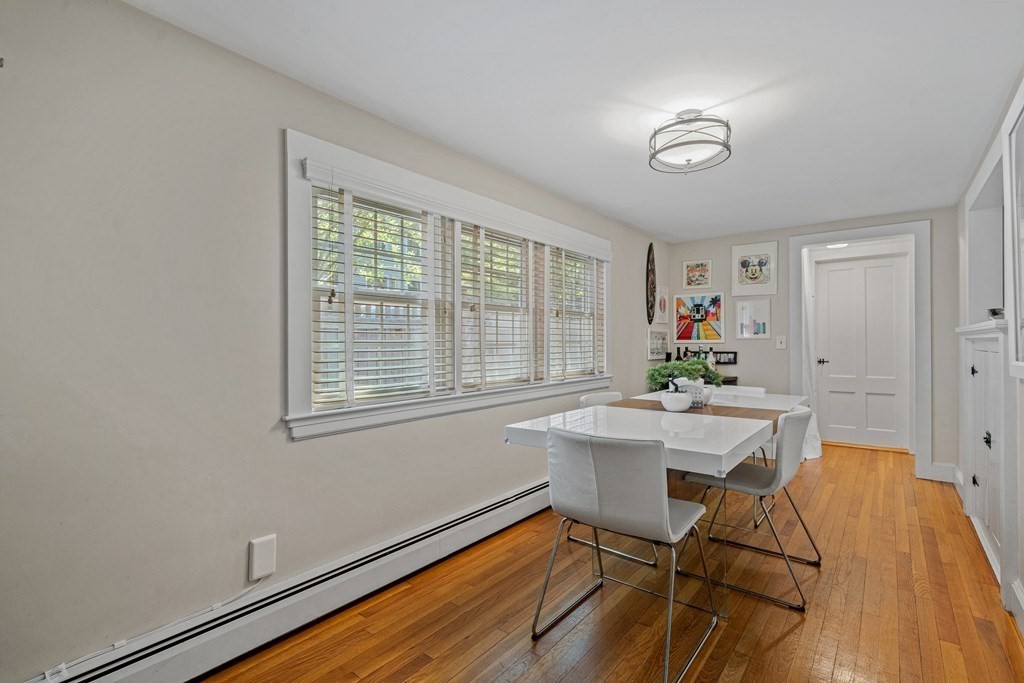 52 Morton Street Andover, MA 01810 - Photo 12 of 27 a view of a workspace with furniture and a window