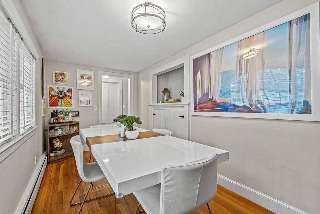 52 Morton Street Andover, MA 01810 - Photo 13 of 27 a view of a dining room with furniture window and outside view