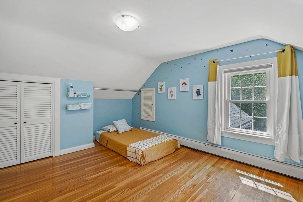 52 Morton Street Andover, MA 01810 - Photo 20 of 27 a bedroom with a bed and a window