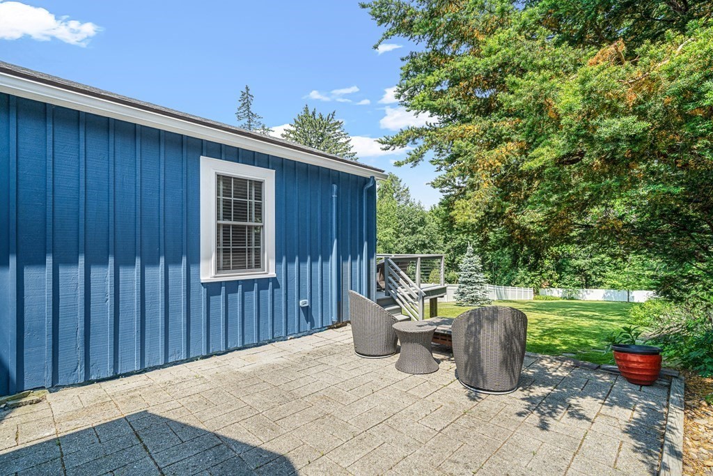 52 Morton Street Andover, MA 01810 - Photo 23 of 27 a view of a porch with furniture