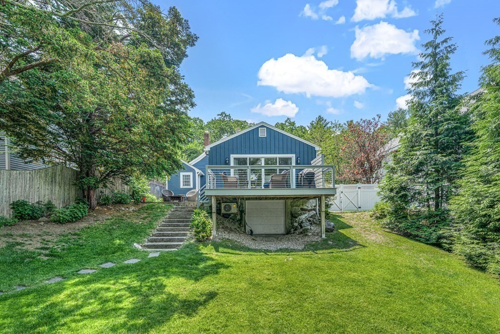 52 Morton Street Andover, MA 01810 - Photo 24 of 27 a view of a house with a big yard and large trees