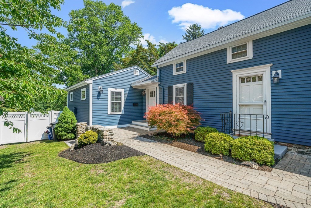 52 Morton Street Andover, MA 01810 - Photo 4 of 27 a front view of a house with garden