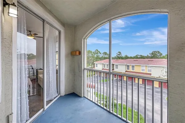 a view of a large window with a balcony
