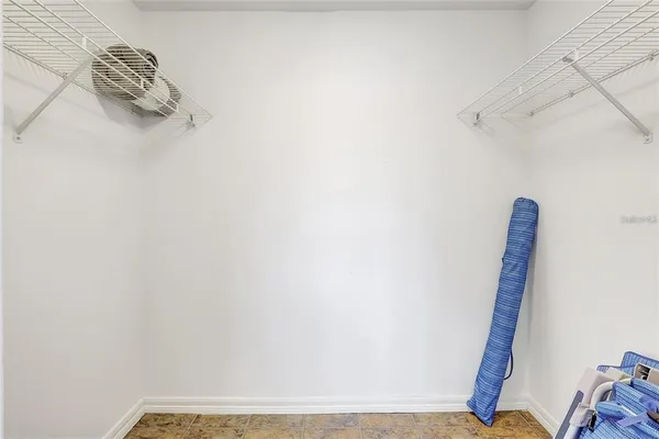 a view of small space with racks on the wall