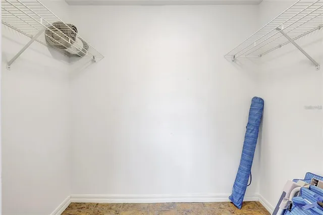 a view of small space with racks on the wall