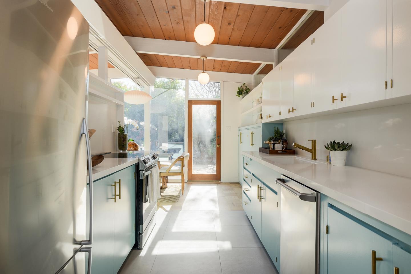 2 Roosevelt Circle Palo Alto, CA 94306 - Photo 15 of 42 a kitchen with stainless steel appliances a sink stove and refrigerator