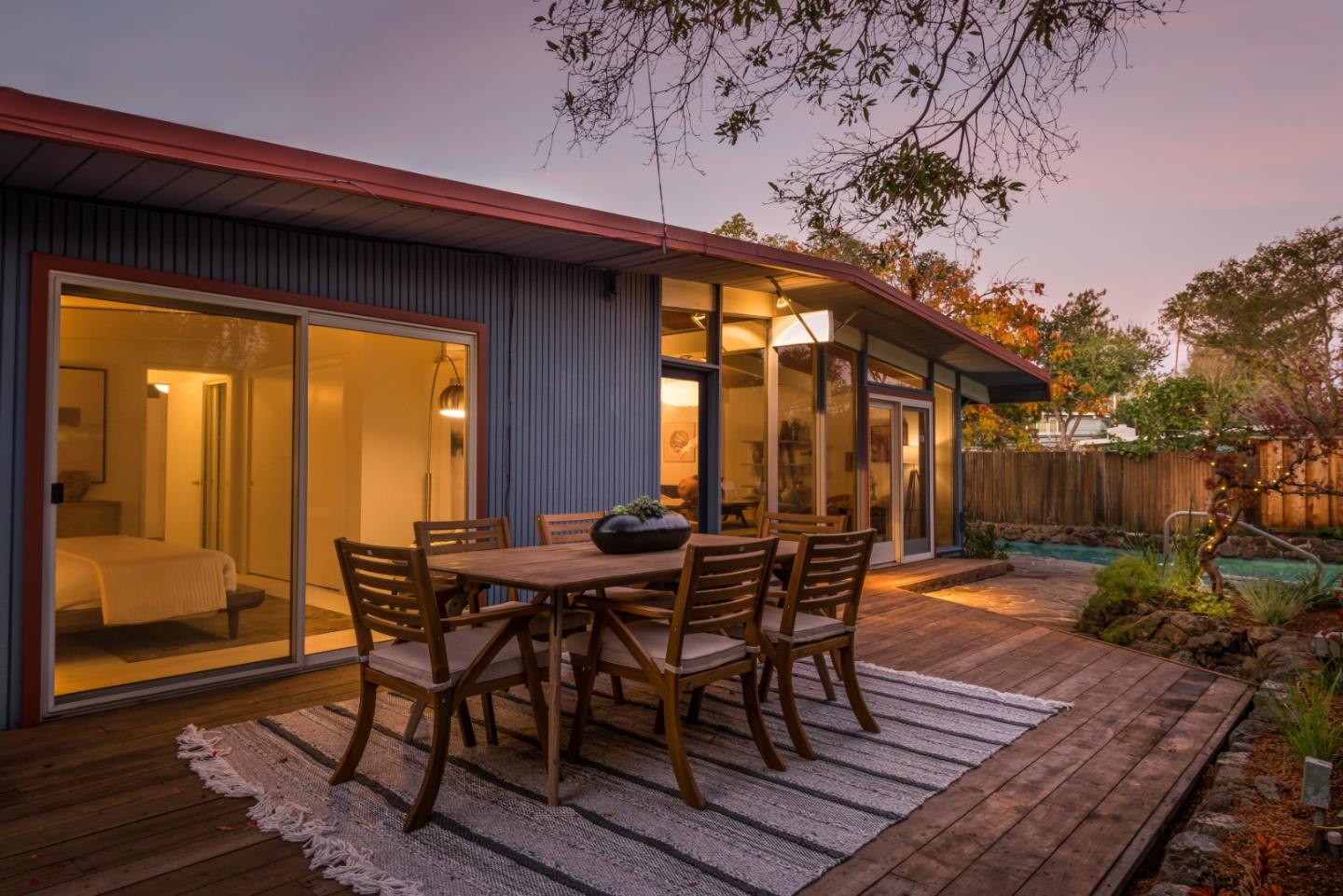 2 Roosevelt Circle Palo Alto, CA 94306 - Photo 3 of 42 a view of a patio with a table and chairs and potted plants