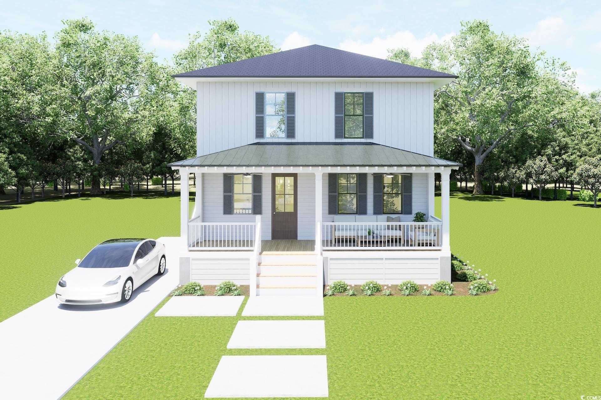 View of front of home featuring a porch, a front lawn, and driveway