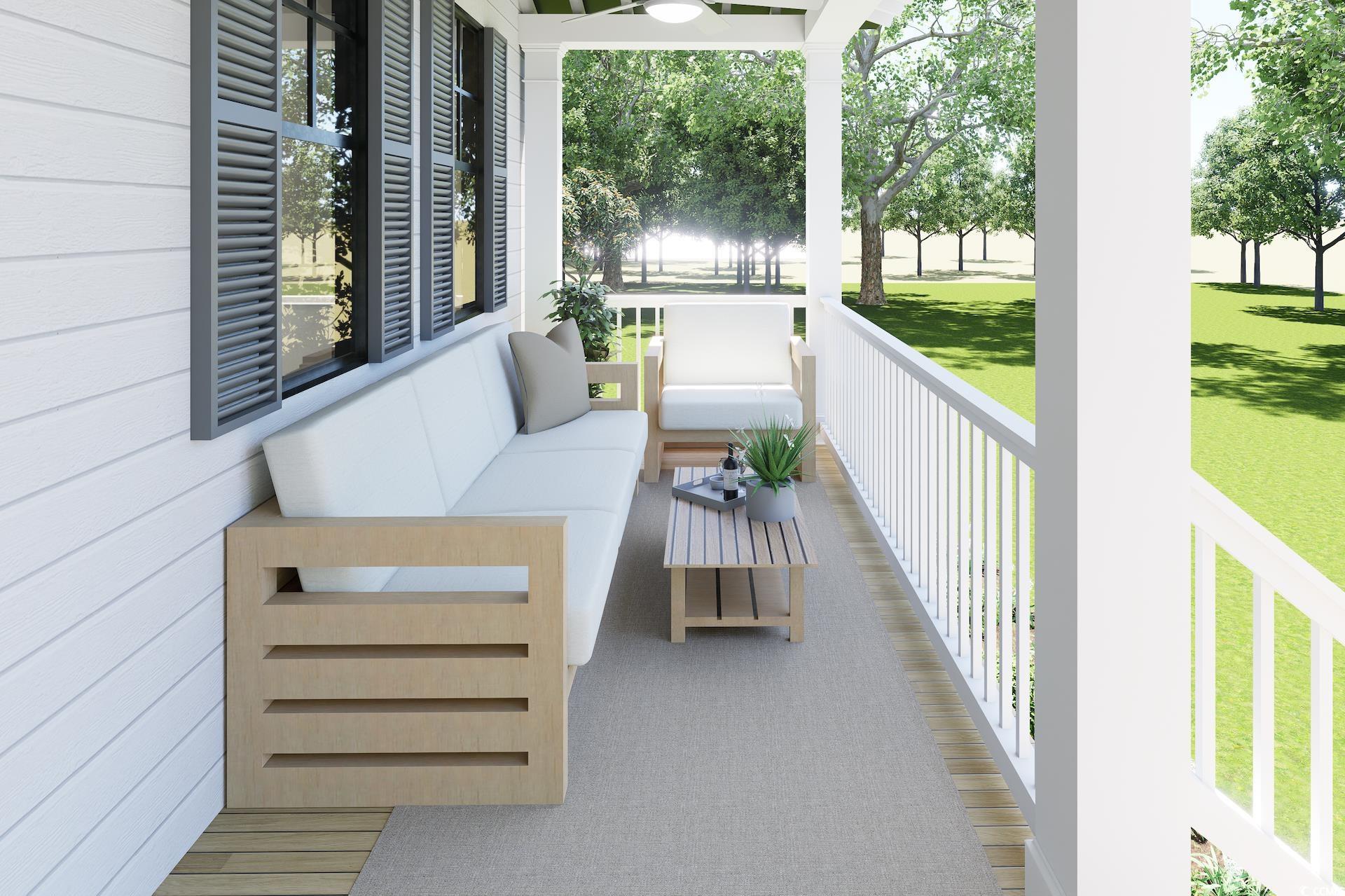 310 King Street Georgetown, SC 29440 - Photo 5 of 23 Porch with ceiling fan, a sunroom, and outdoor lounge area