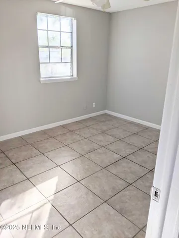 en empty room with a window