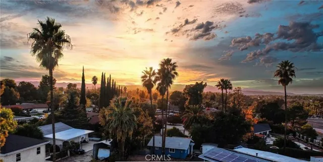 a view of a city with lots of trees