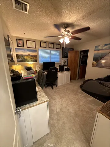 a bathroom with a toilet a sink and a window