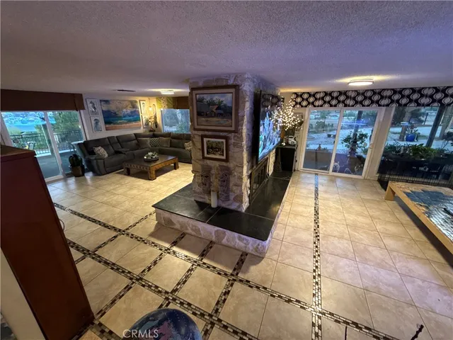 a large white kitchen with a large window