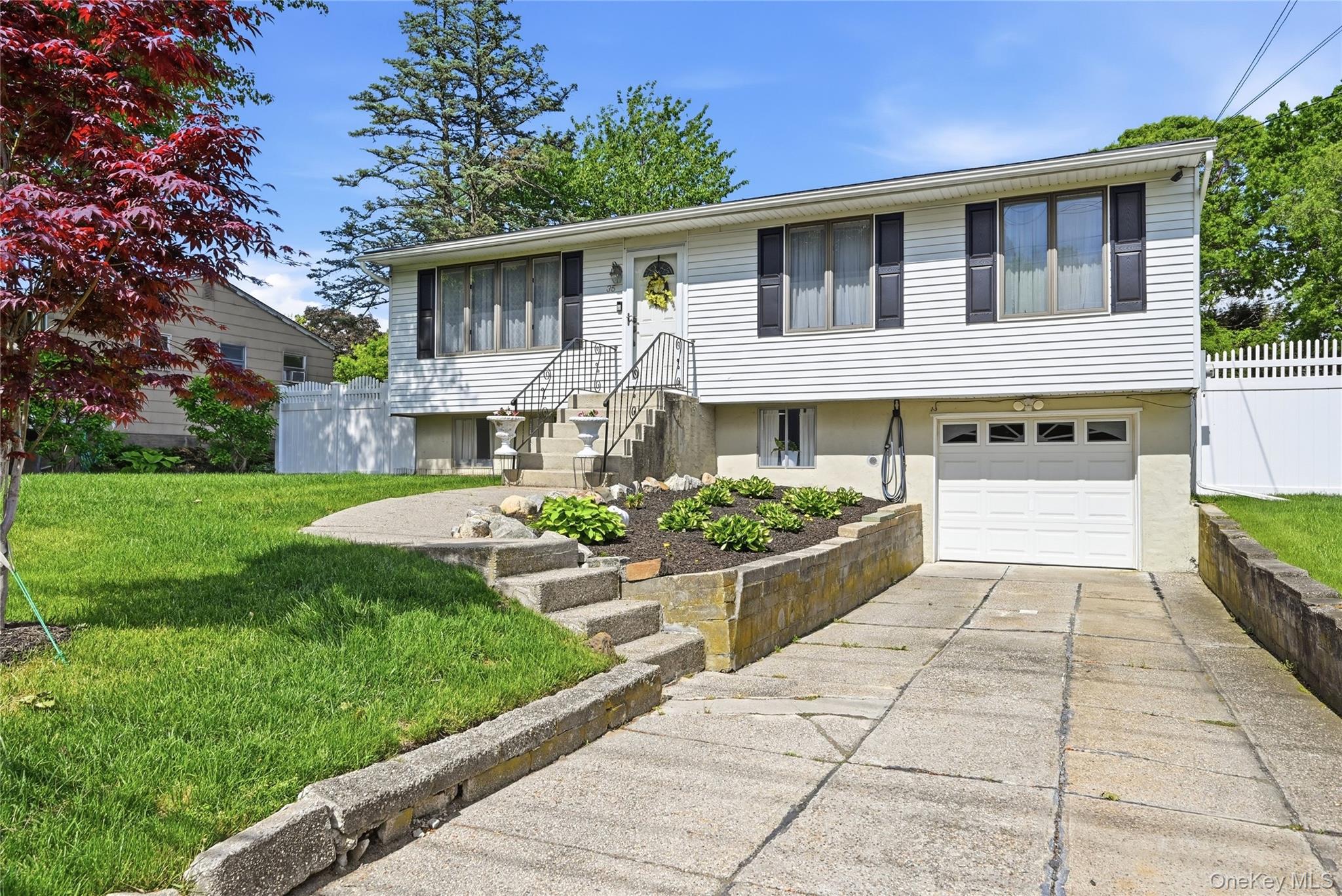35 Randall Road Shoreham, NY 11786 - Photo 2 of 32 a front view of a house with a yard