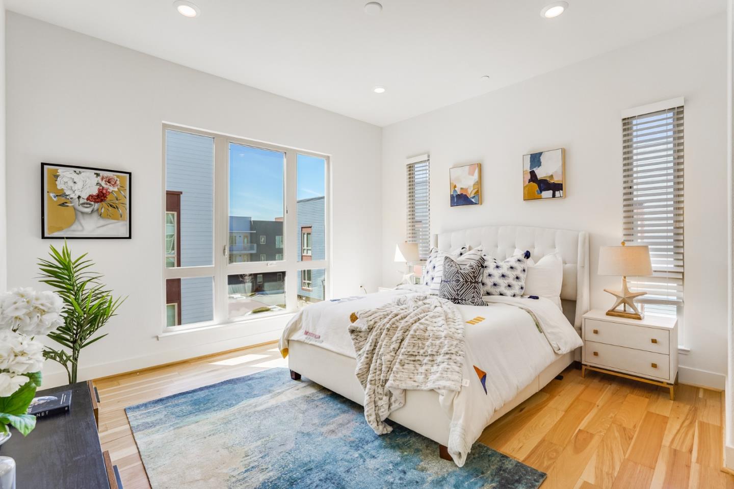 360 Riesling Avenue, Unit 32 Milpitas, CA 95035 - Photo 11 of 32 a bedroom with a bed and a couch