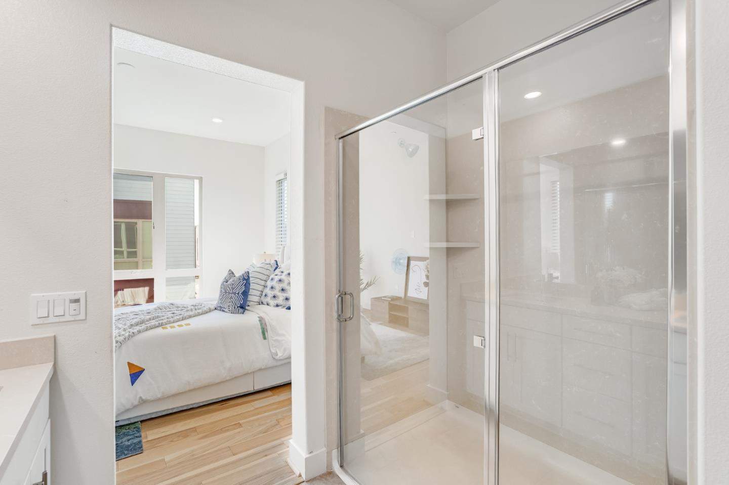 360 Riesling Avenue, Unit 32 Milpitas, CA 95035 - Photo 15 of 32 a en suite bathroom with a glass door shower