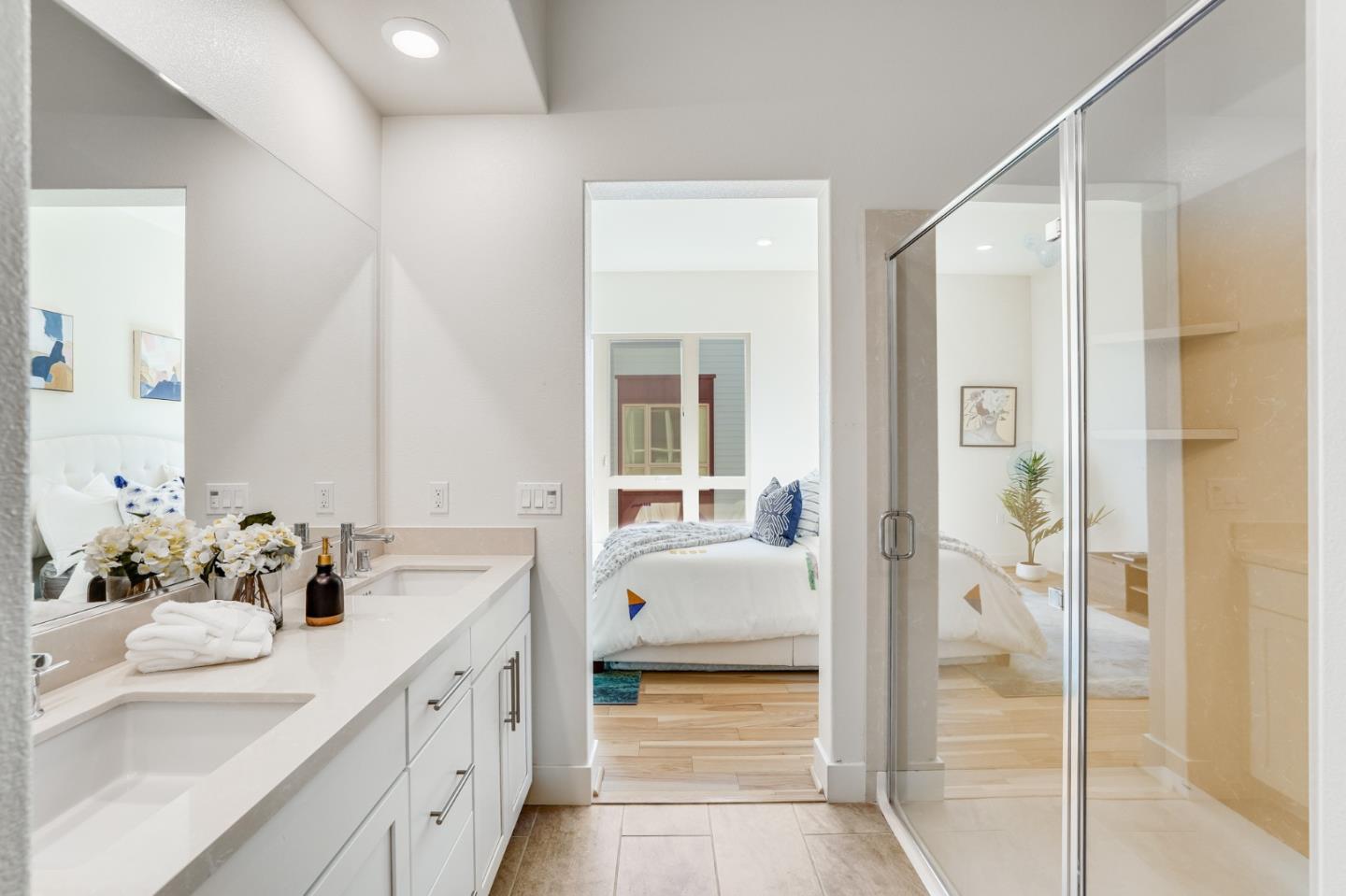 360 Riesling Avenue, Unit 32 Milpitas, CA 95035 - Photo 16 of 32 a en suite bathroom with a double vanity sink and a mirror