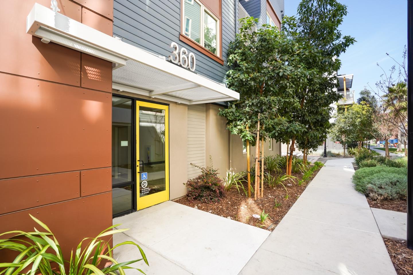 360 Riesling Avenue, Unit 32 Milpitas, CA 95035 - Photo 24 of 32 a view of a brick house with a large windows