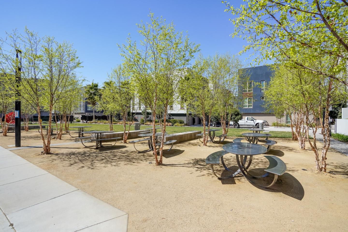 360 Riesling Avenue, Unit 32 Milpitas, CA 95035 - Photo 29 of 32 a view of a swimming pool with chairs and tables