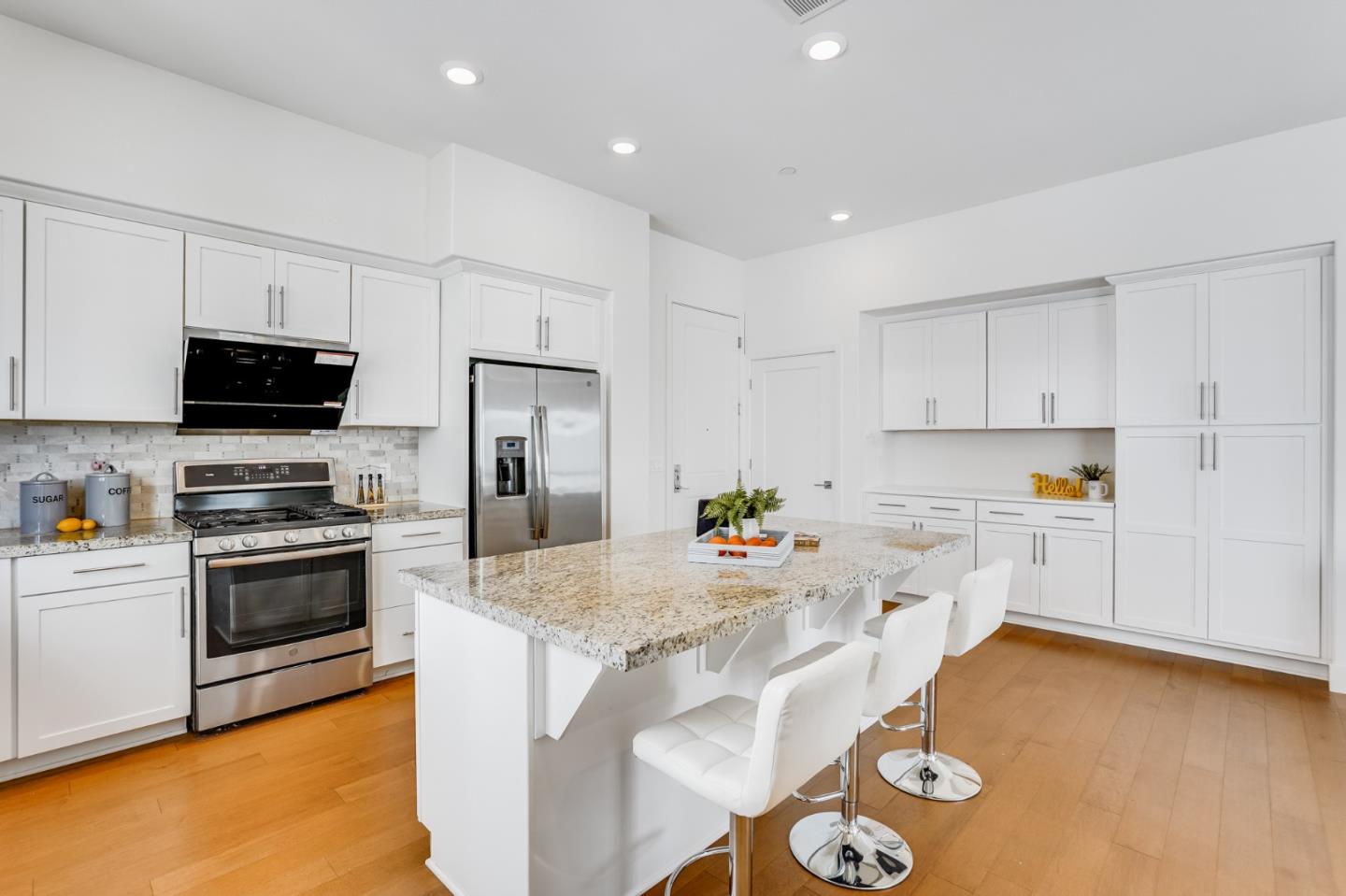 360 Riesling Avenue, Unit 32 Milpitas, CA 95035 - Photo 8 of 32 a kitchen with a sink appliances and cabinets