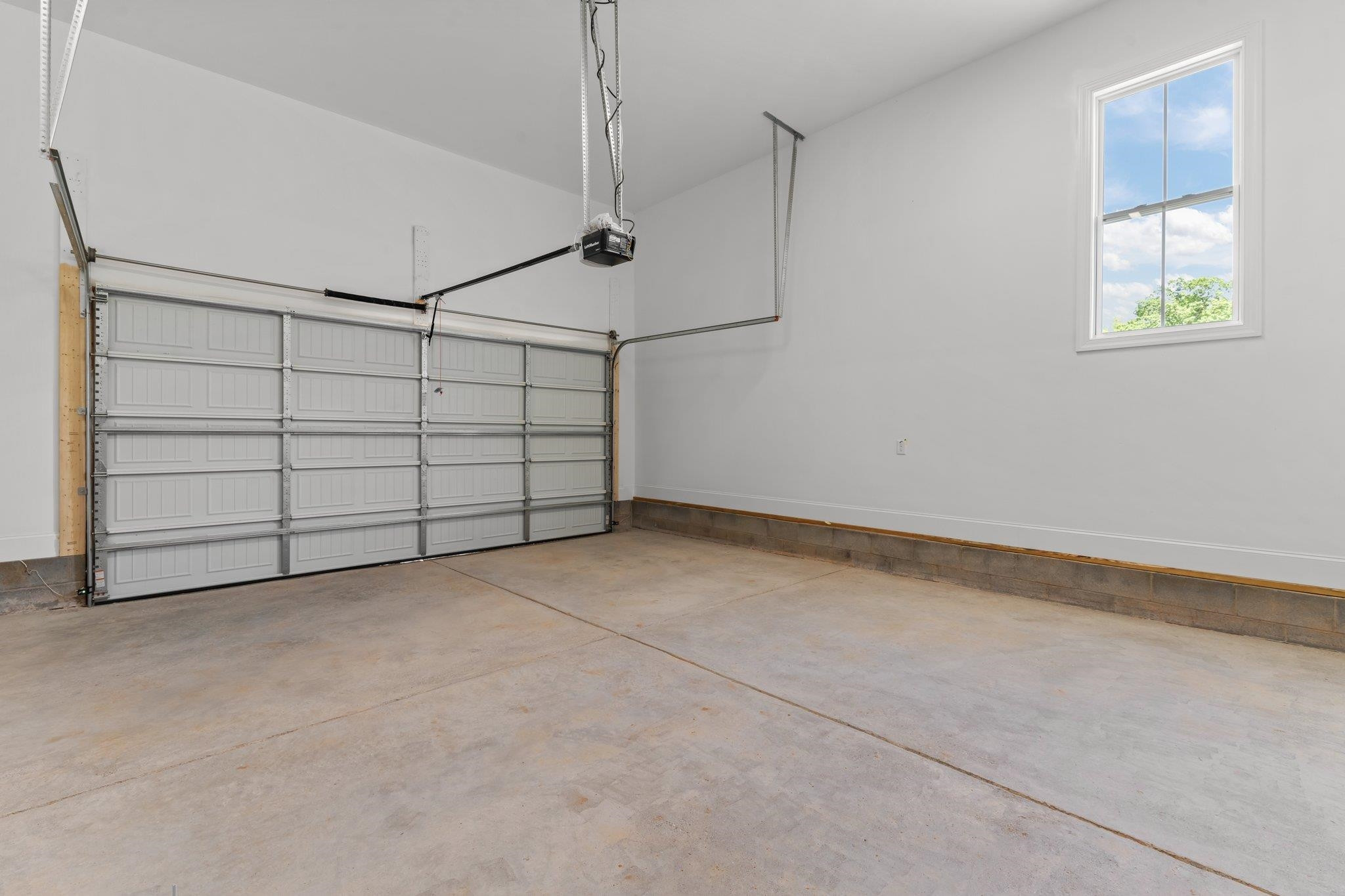 9312 Field Maple Court Raleigh, NC 27613 - Photo 41 of 49 Two car garage