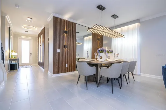 a bathroom with a granite countertop sink a mirror and a white walls