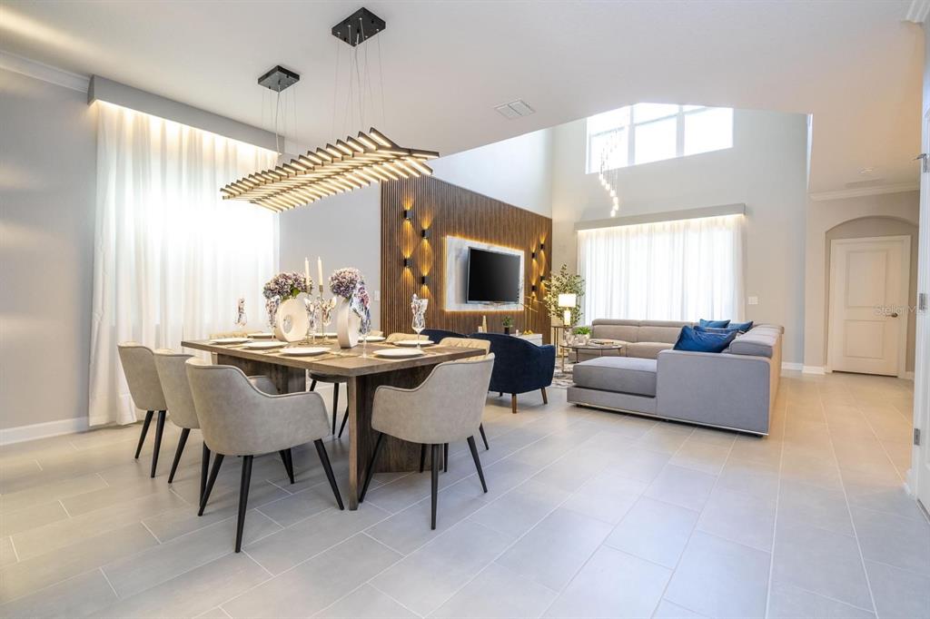 8964 Takeaway Way Davenport, FL 33896 - Photo 5 of 71 a dining room with furniture and window
