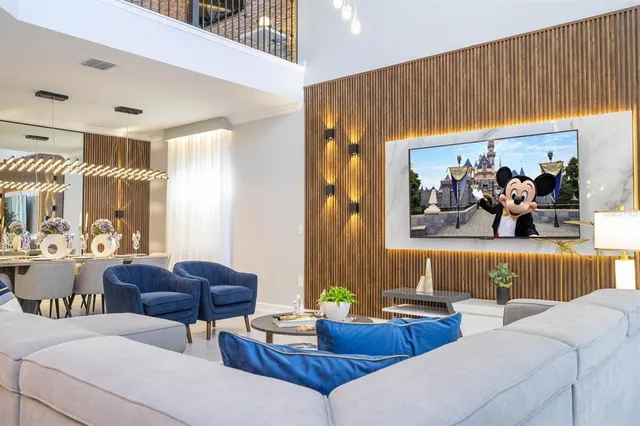 a kitchen with kitchen island granite countertop lots of counter top space and stainless steel appliances