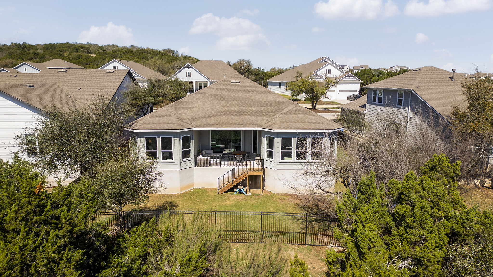 546 Hazy Hills Loop Dripping Springs, TX 78620 - Photo 34 of 40 The backyard offers privacy and tranquility while backing to scenic greenbelt surroundings.