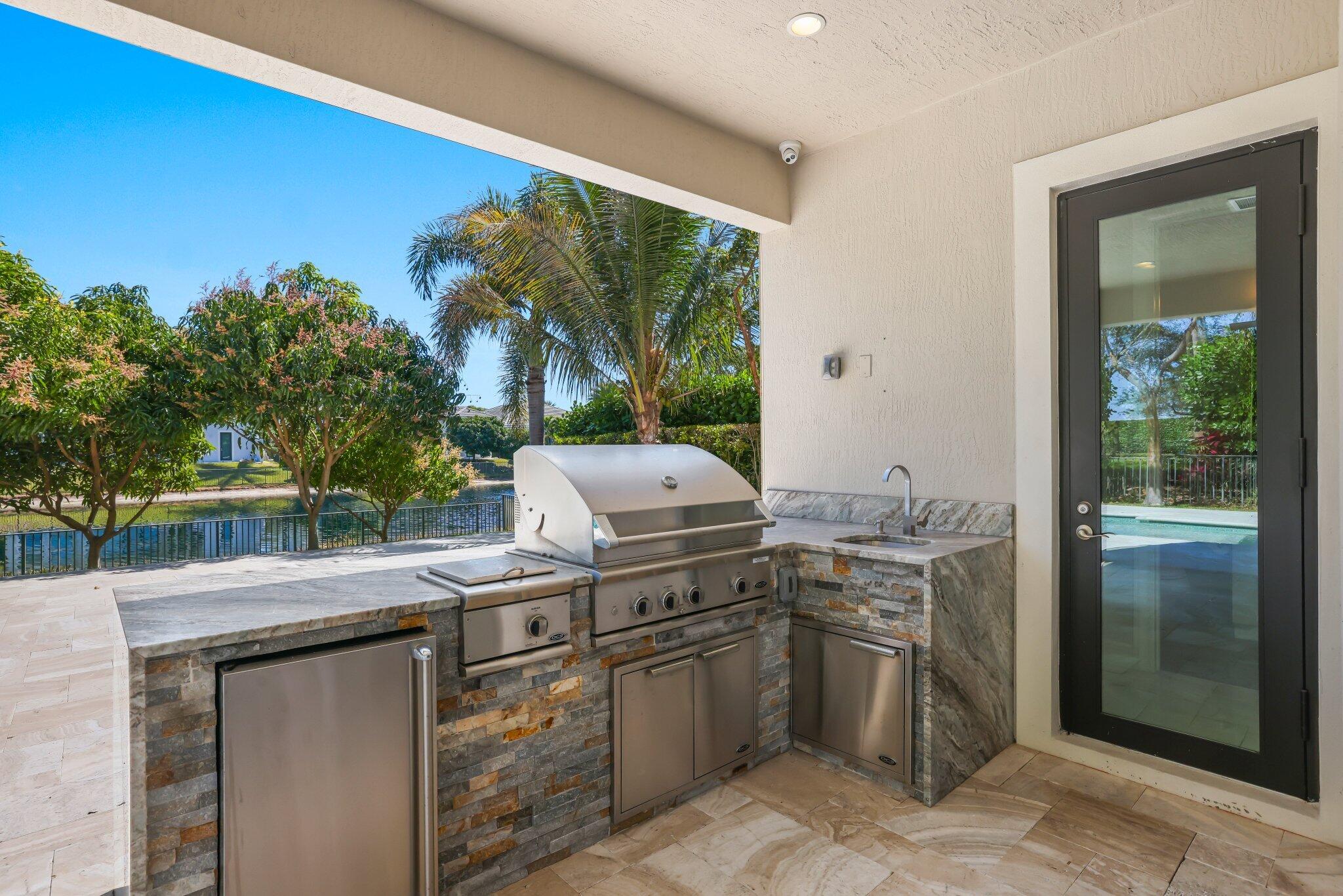 7015 Northwest 27th Avenue Boca Raton, FL 33496 - Photo 23 of 80 Covered Patio & Summer Kitchen
