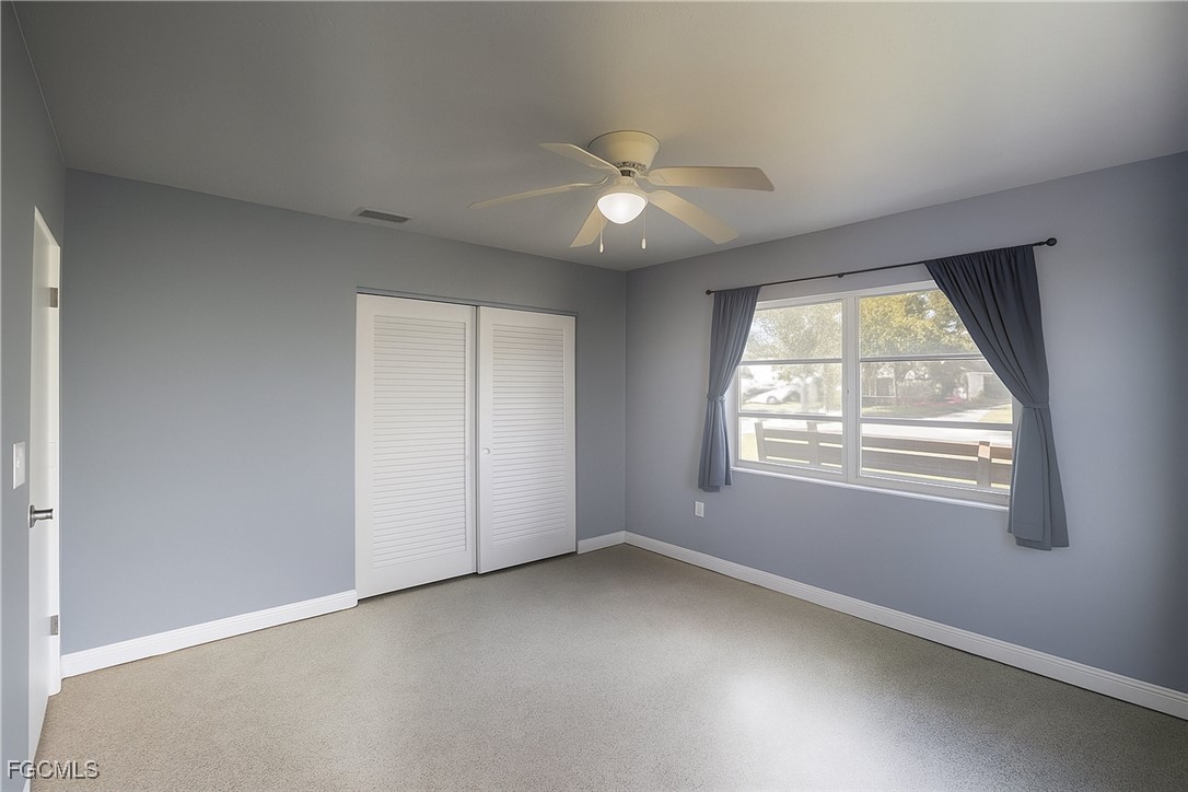 1440 Mandel Road Fort Myers, FL 33919 - Photo 14 of 40 an empty room with a window