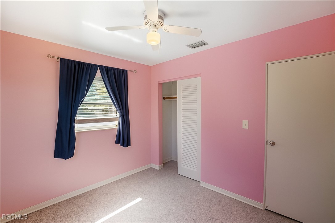 1440 Mandel Road Fort Myers, FL 33919 - Photo 17 of 40 a view of a livingroom with an empty space and a balcony