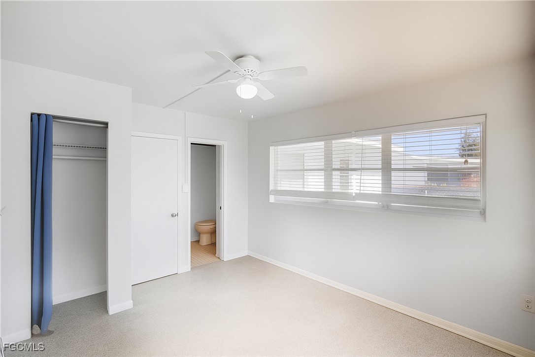 1440 Mandel Road Fort Myers, FL 33919 - Photo 19 of 40 a view of an empty room with a window