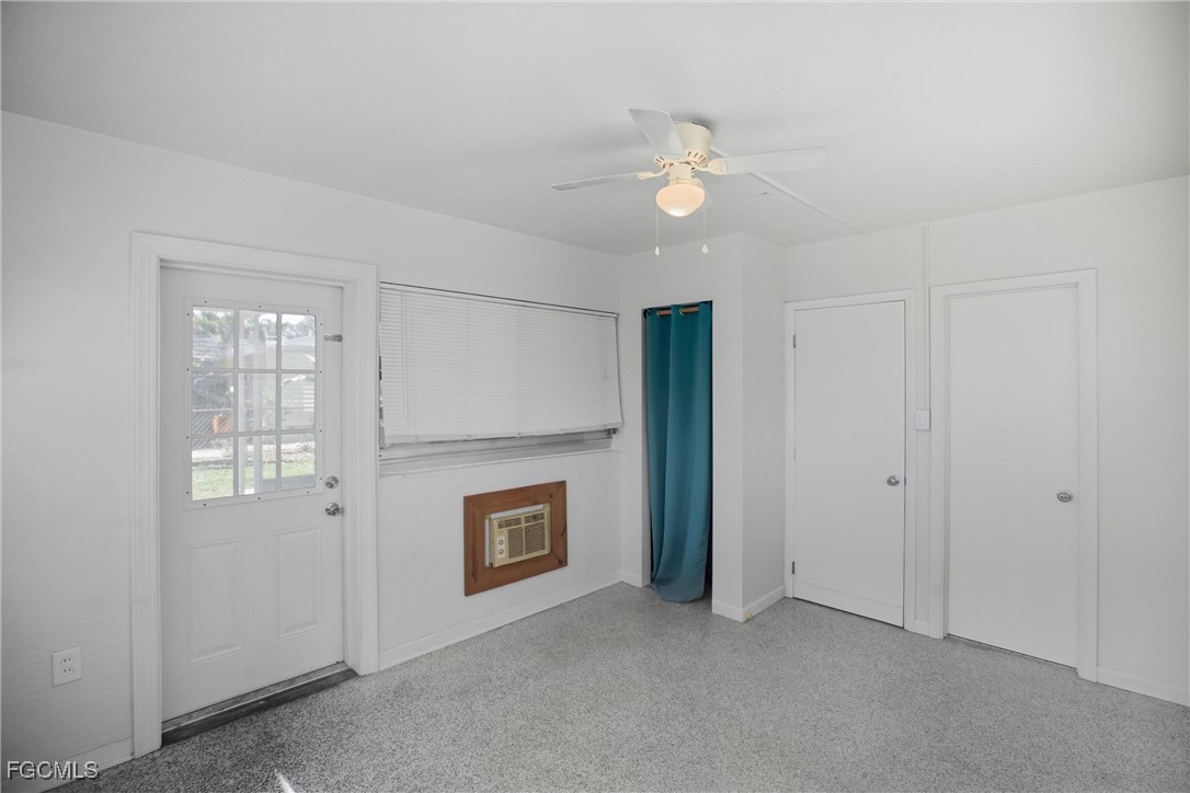 1440 Mandel Road Fort Myers, FL 33919 - Photo 20 of 40 an empty room with windows cabinet and fireplace