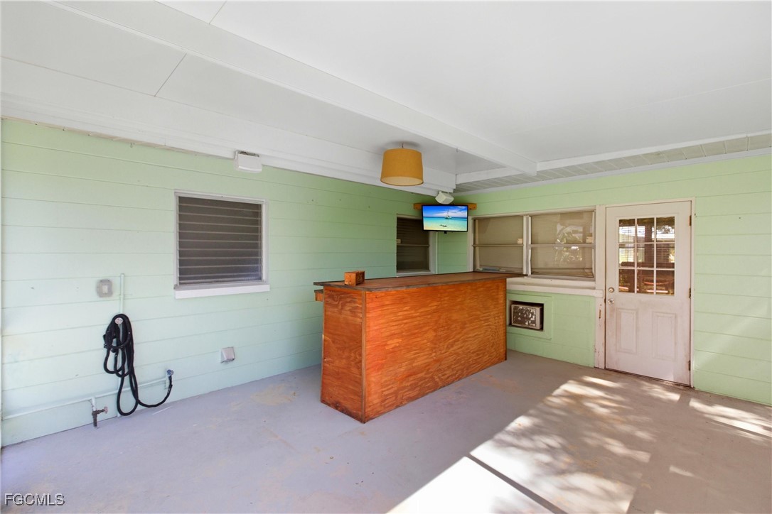 1440 Mandel Road Fort Myers, FL 33919 - Photo 25 of 40 a view of kitchen with refrigerator and window