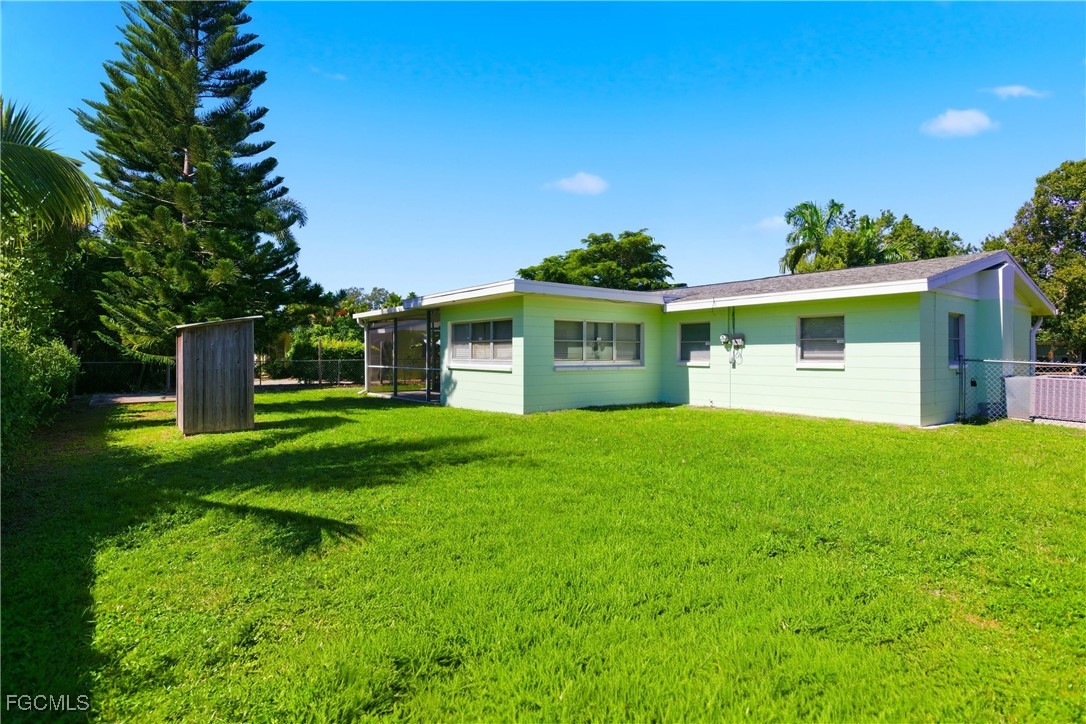 1440 Mandel Road Fort Myers, FL 33919 - Photo 31 of 40 a front view of a house with a yard