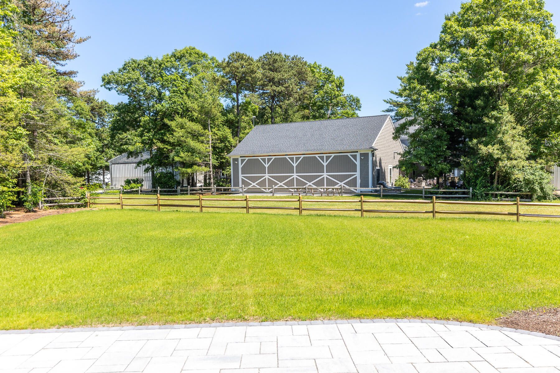 144 Rickenbacker Road East Falmouth, MA 02536 - Photo 43 of 50 a house view with swimming pool in front of it