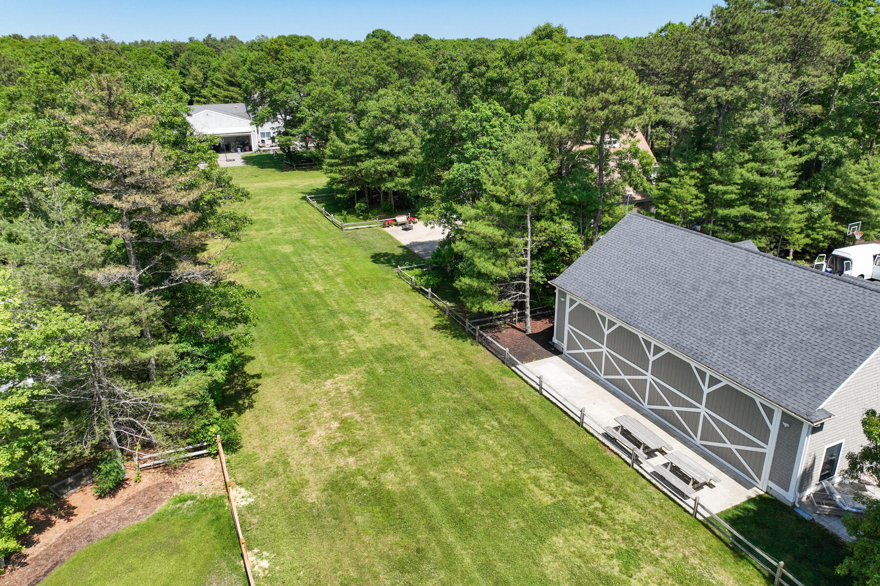 144 Rickenbacker Road East Falmouth, MA 02536 - Photo 47 of 50 a aerial view of a house with a yard