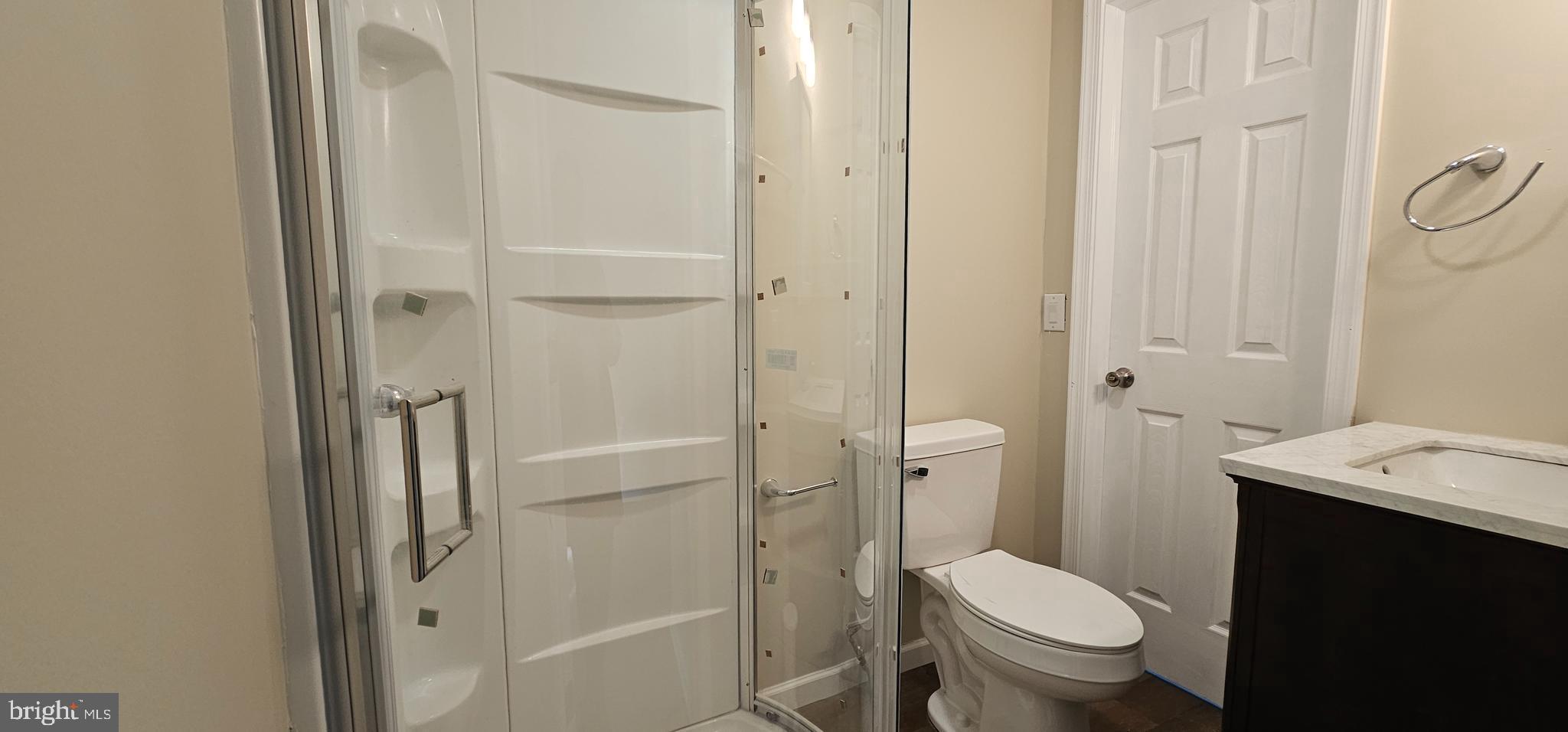 36 Maple Avenue Hatfield, PA 19440 - Photo 15 of 23 a white toilet sitting next to a bathroom sink