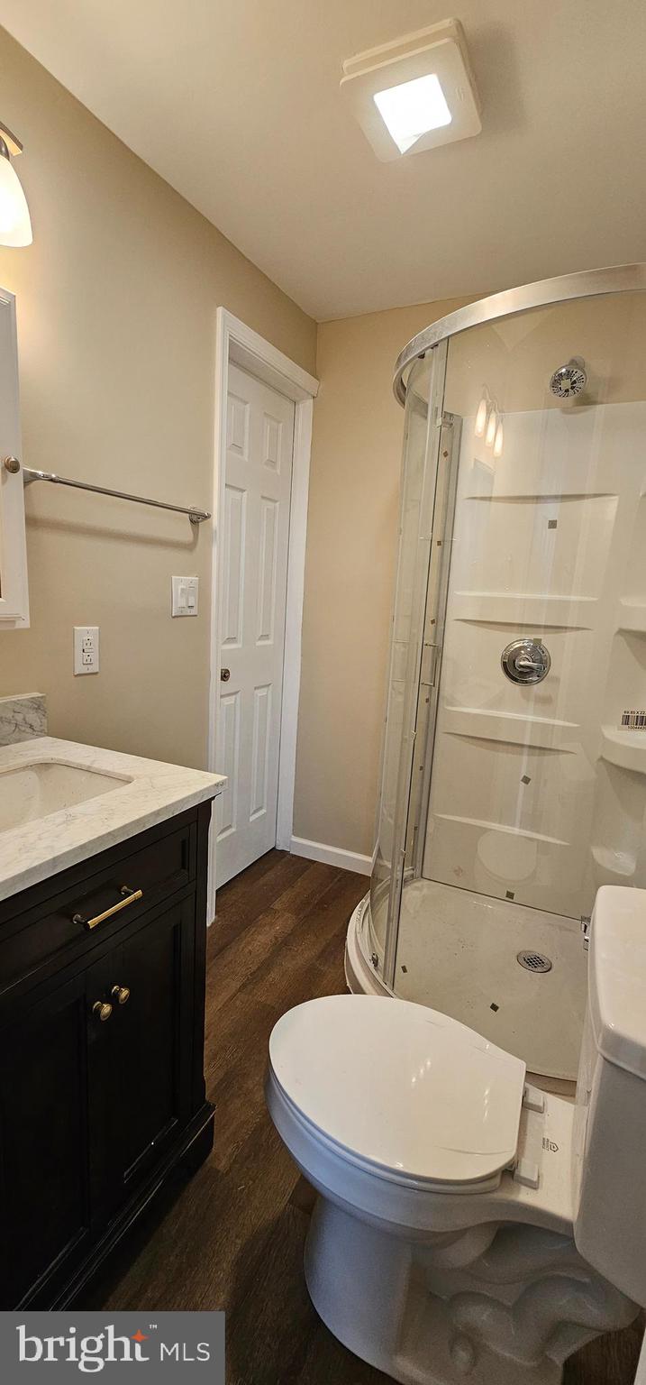 36 Maple Avenue Hatfield, PA 19440 - Photo 17 of 23 a bathroom with a sink a toilet a mirror and shower