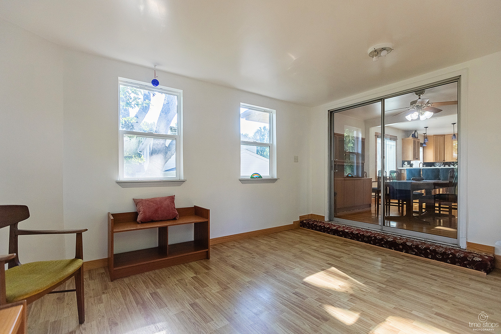 304 Warwick Drive Naperville, IL 60565 - Photo 16 of 41 a living room with furniture and a wooden floor