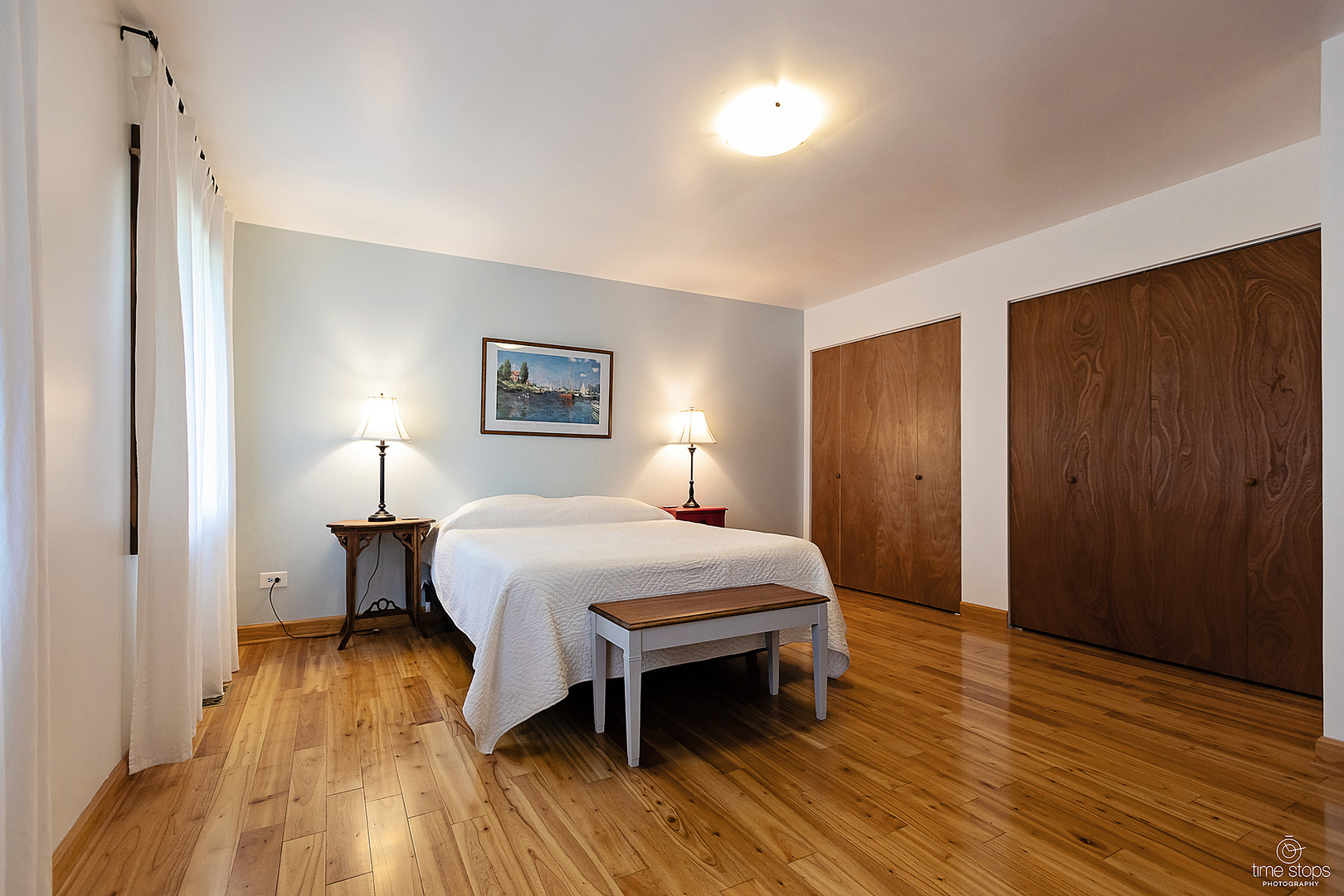 304 Warwick Drive Naperville, IL 60565 - Photo 18 of 41 a bed room with a bed and a night stand